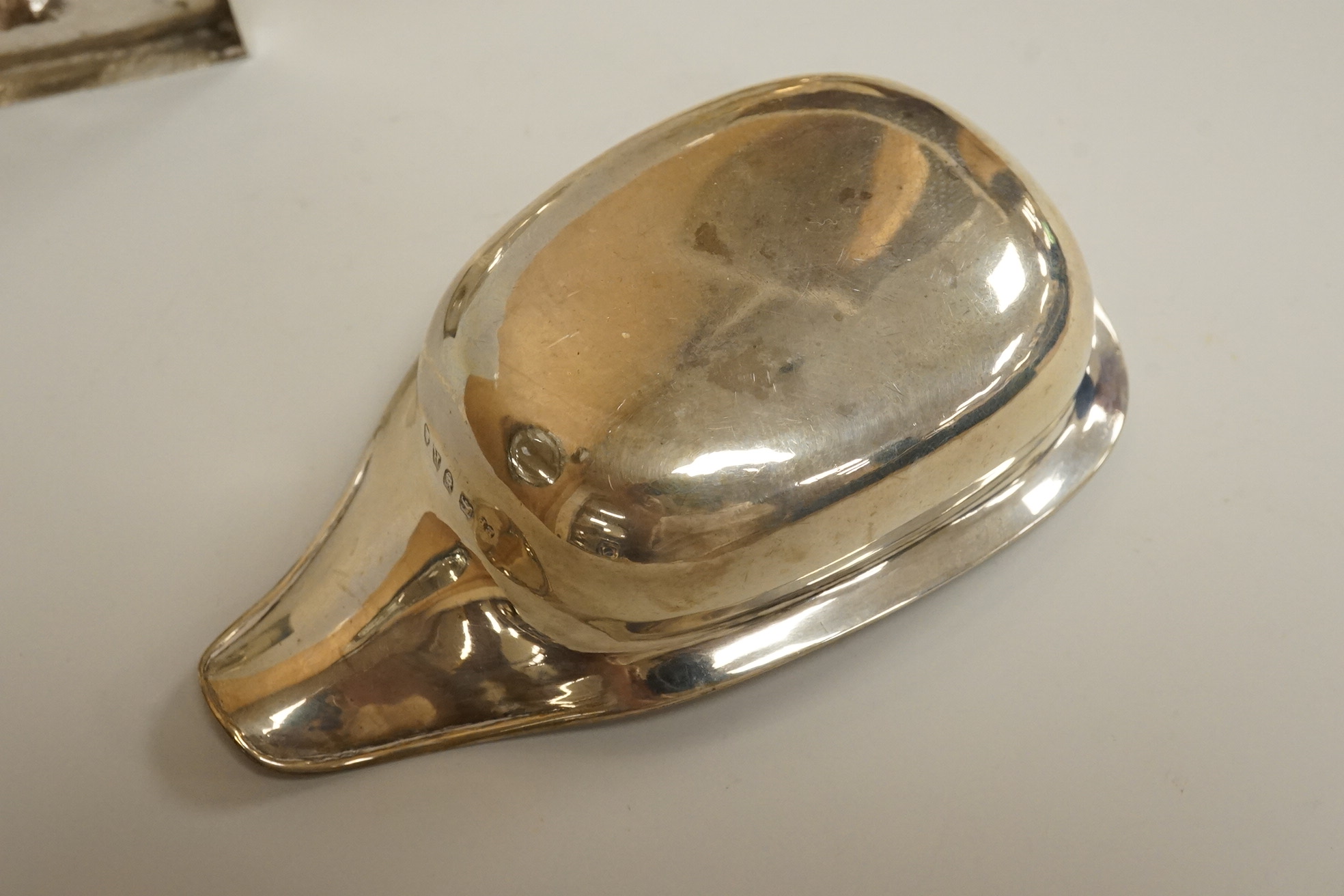 A George III silver pap boat, maker ?? and EB, London 1812, length 12.1 cm, together with a pair of Georgian Scottish silver boat shaped pedestal salts, maker RG, gross weight 7oz.